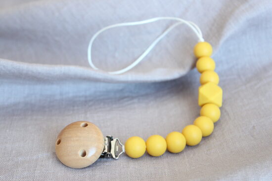 Sinepju krāsas knupīša turētājs