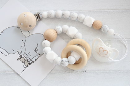 Neitrāla graušanas manta ar knupīša turētāju