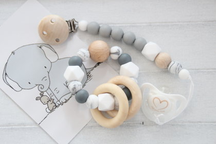 Pelēka graušanas manta ar knupīša turētāju